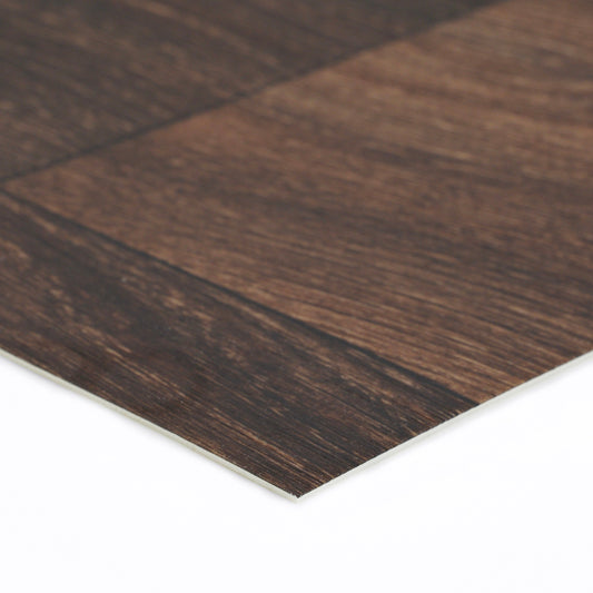 Dark brown wooden laminate flooring with a sleek finish, perfect for modern home interiors.
