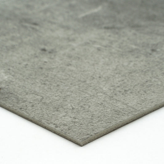 Gray textured stone slab, ideal for flooring or countertops, made from durable composite material.