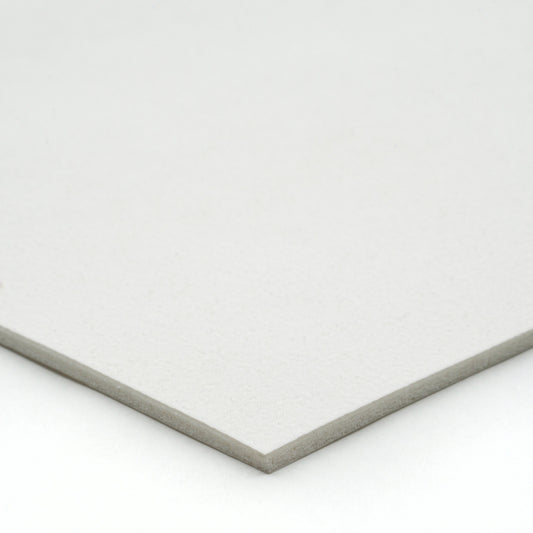 White textured cardstock, ideal for crafting and printing projects, thick and durable material.