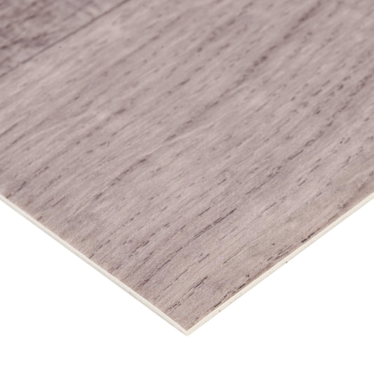 Gray laminate flooring with a textured wood finish, ideal for modern interior design.