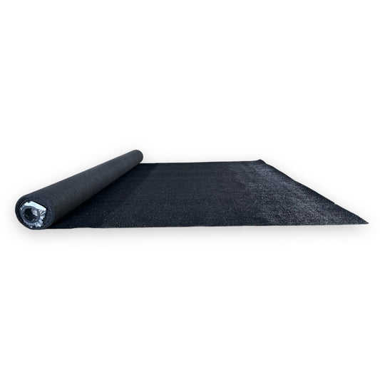 Black outdoor carpet roll, durable synthetic material, ideal for patios and decks.