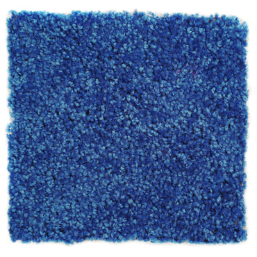 Soft blue shag carpet square, perfect for enhancing cozy spaces and modern decor.