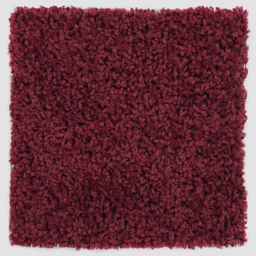 Plush burgundy area rug, soft texture, perfect for adding warmth to any room.