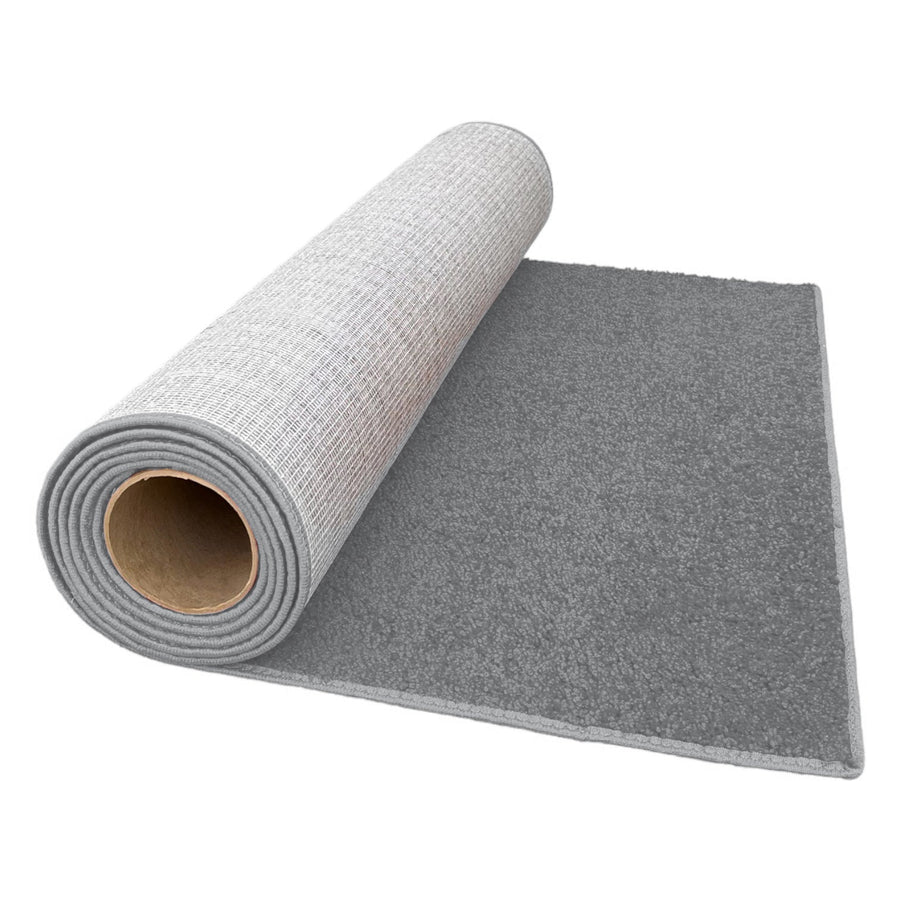 Soft gray area rug roll, plush texture, modern design, perfect for living rooms or bedrooms.