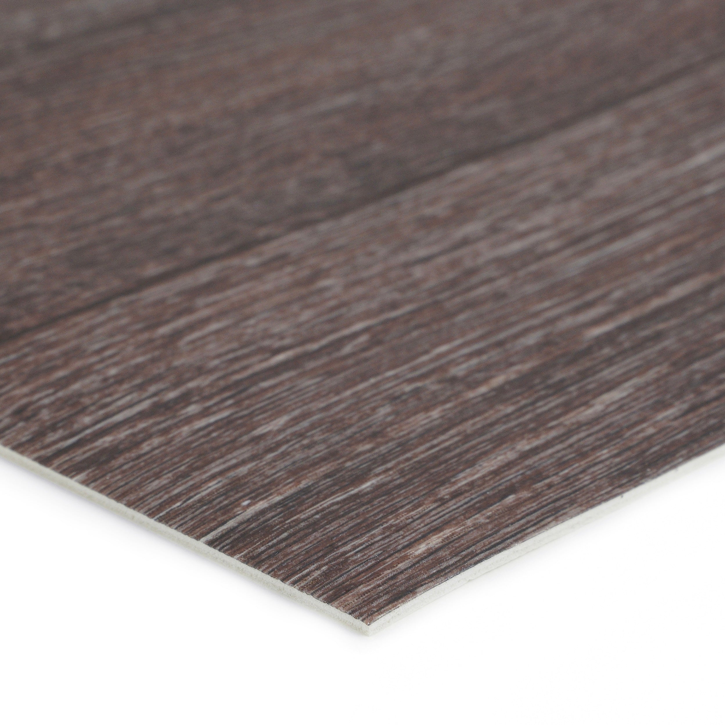 Close-up of dark wood laminate flooring, featuring a textured surface and a durable, waterproof design.
