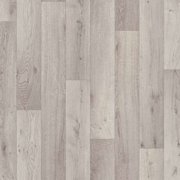 Light gray wood laminate flooring planks with a natural grain and textured finish for modern interiors.