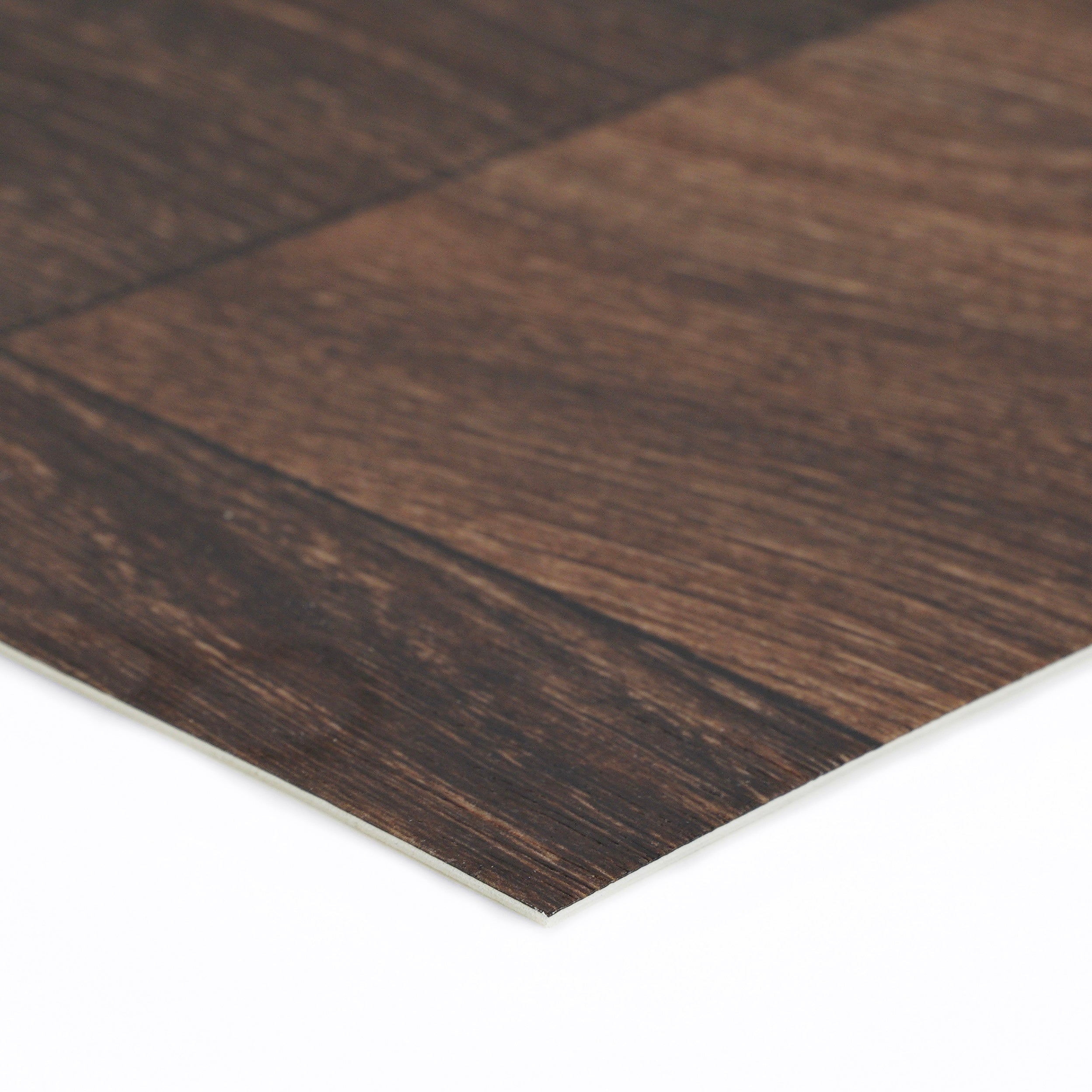 Dark brown wooden laminate flooring with a sleek finish, perfect for modern home interiors.