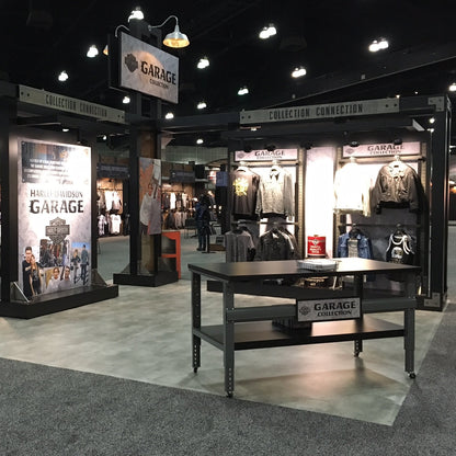 Harley-Davidson Garage Collection display featuring jackets and gear in a stylish retail setup.