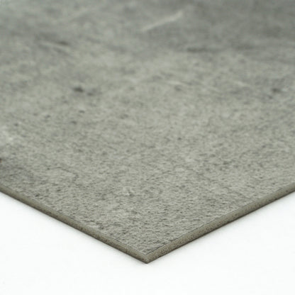 Gray textured stone slab, ideal for flooring or countertops, made from durable composite material.