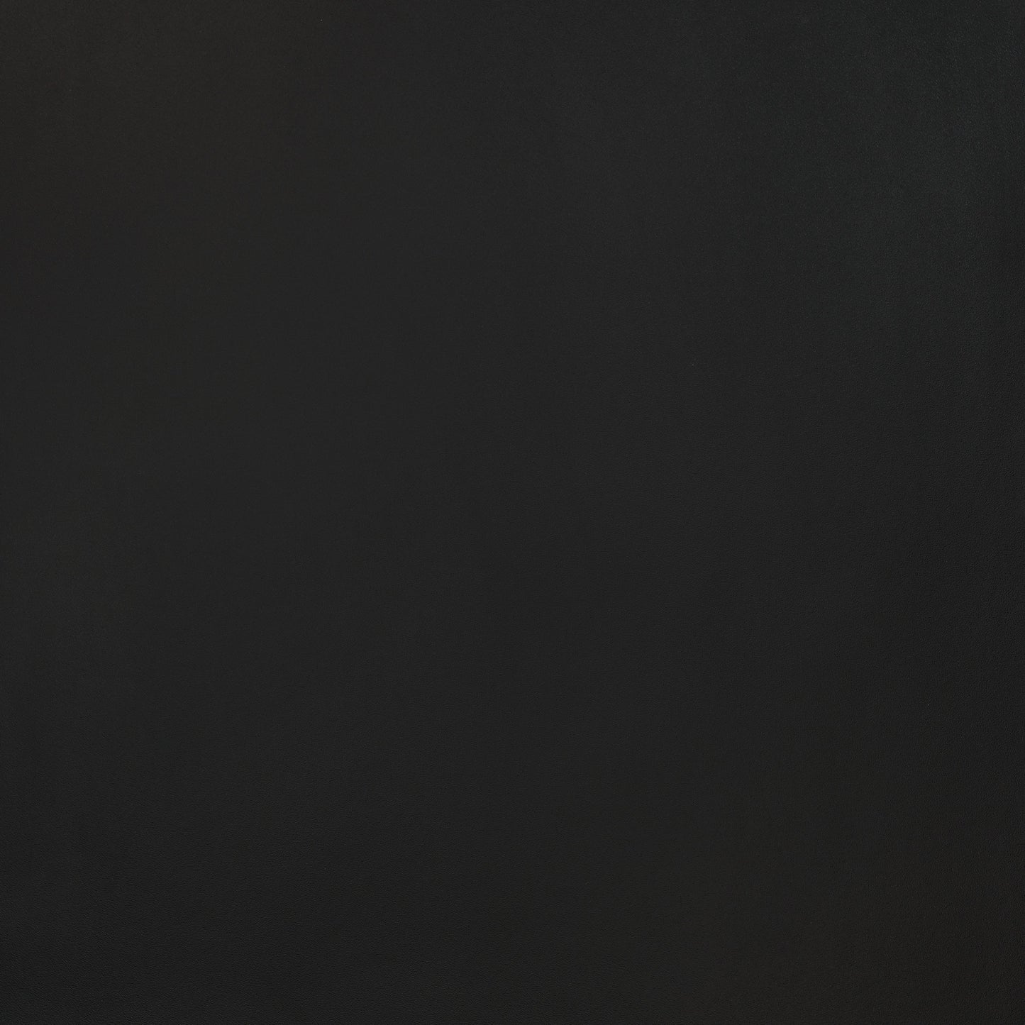 Smooth black leather texture, ideal for stylish accessories and home decor.