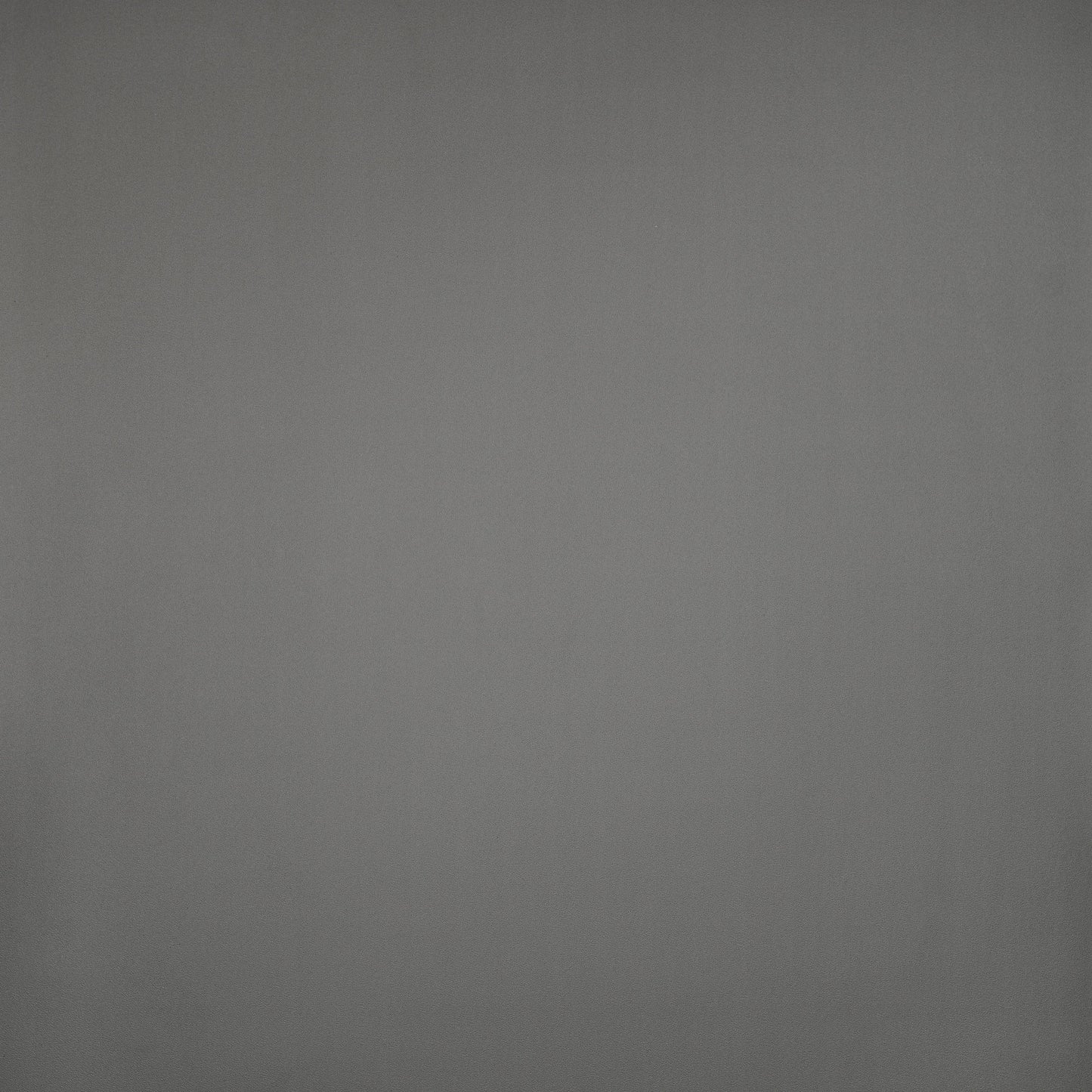 Gray textile background, smooth fabric ideal for upholstery and decor.