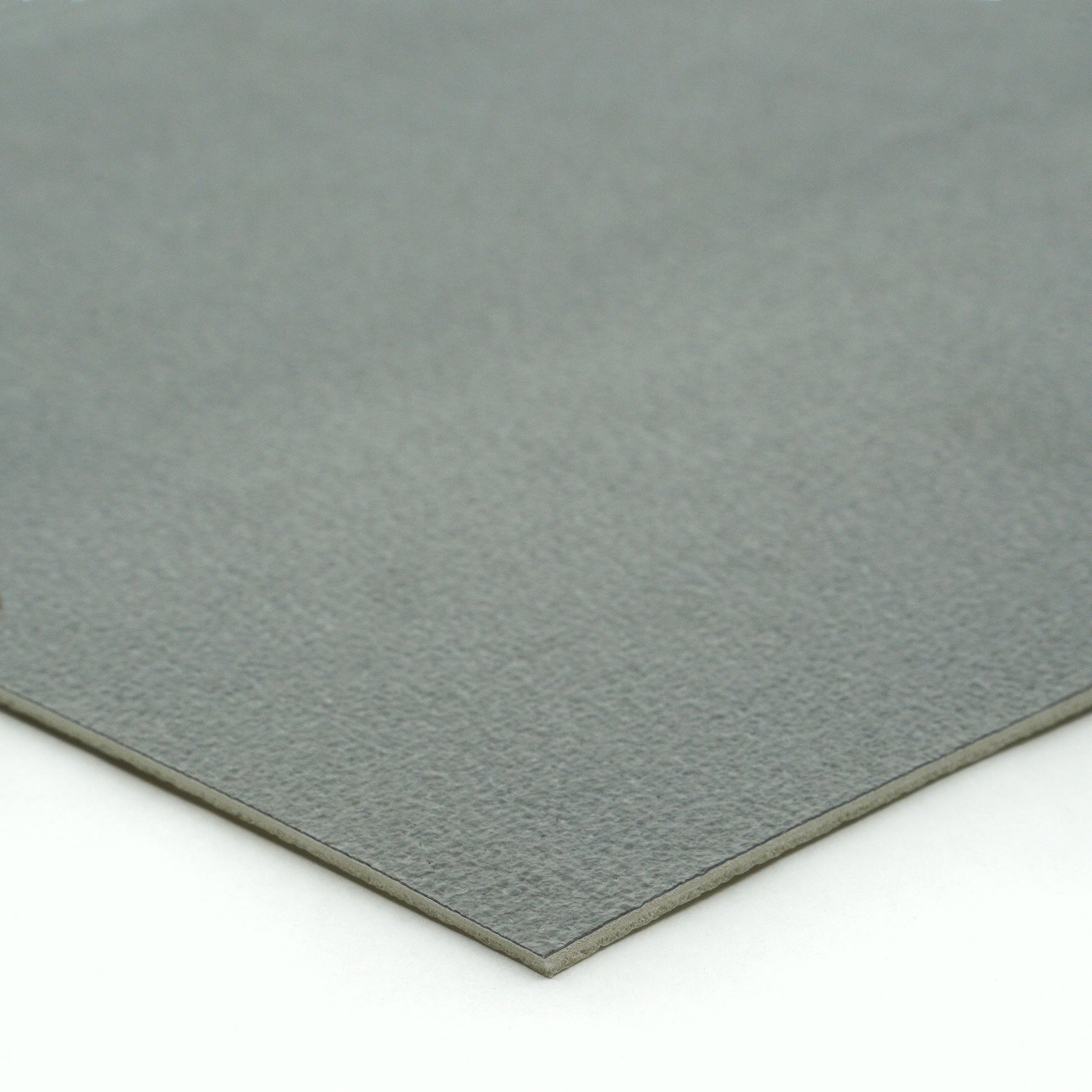 Gray suede fabric sheet, soft texture, ideal for crafts and upholstery projects.
