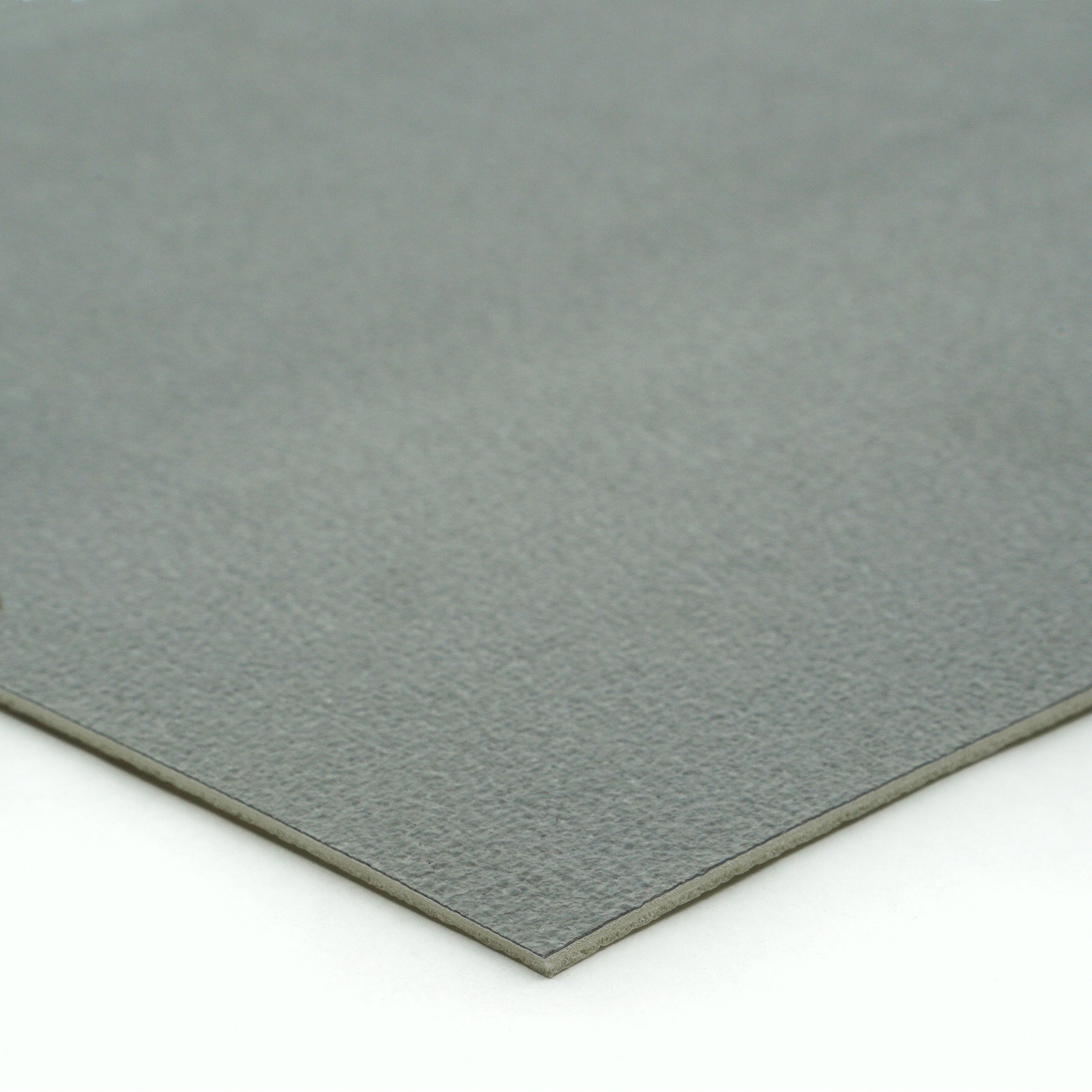 Gray suede fabric sheet, soft texture, ideal for crafts and upholstery projects.
