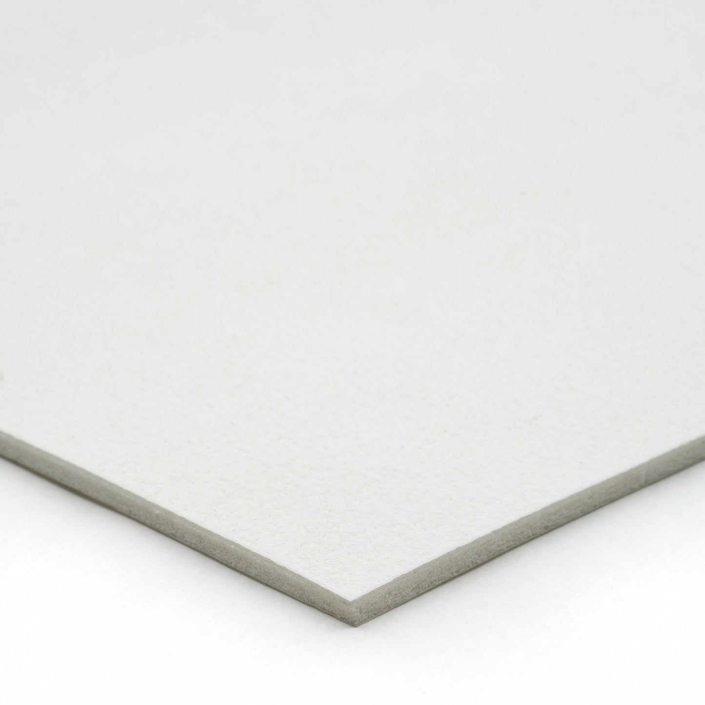 White textured cardstock, ideal for crafting and printing projects,  thick and durable material.