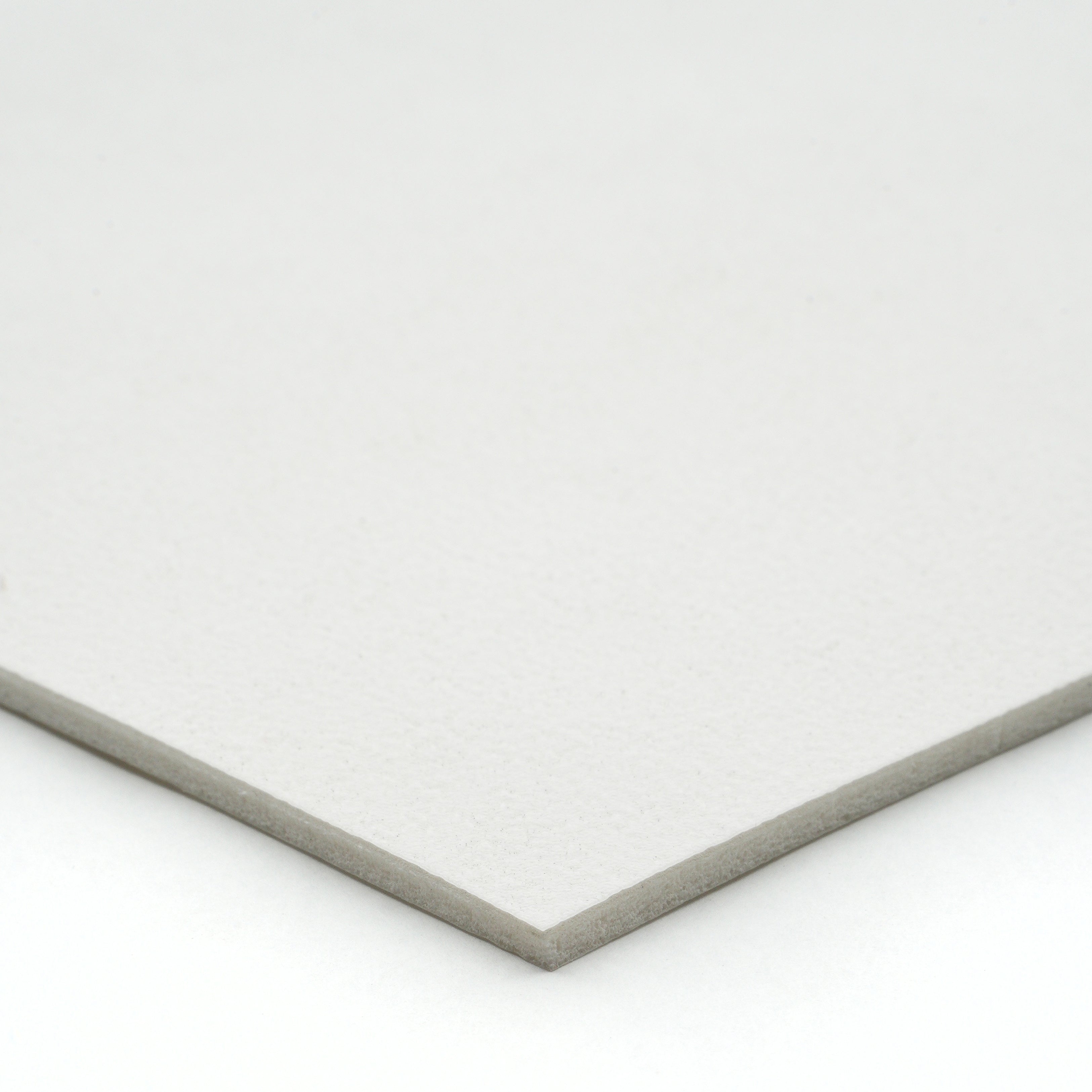 White textured cardstock, ideal for crafting and printing projects,  thick and durable material.