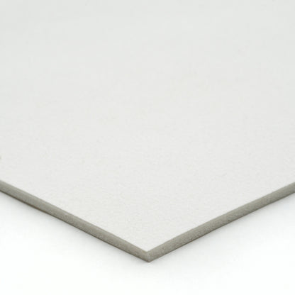 White textured cardstock, ideal for crafting and printing projects,  thick and durable material.