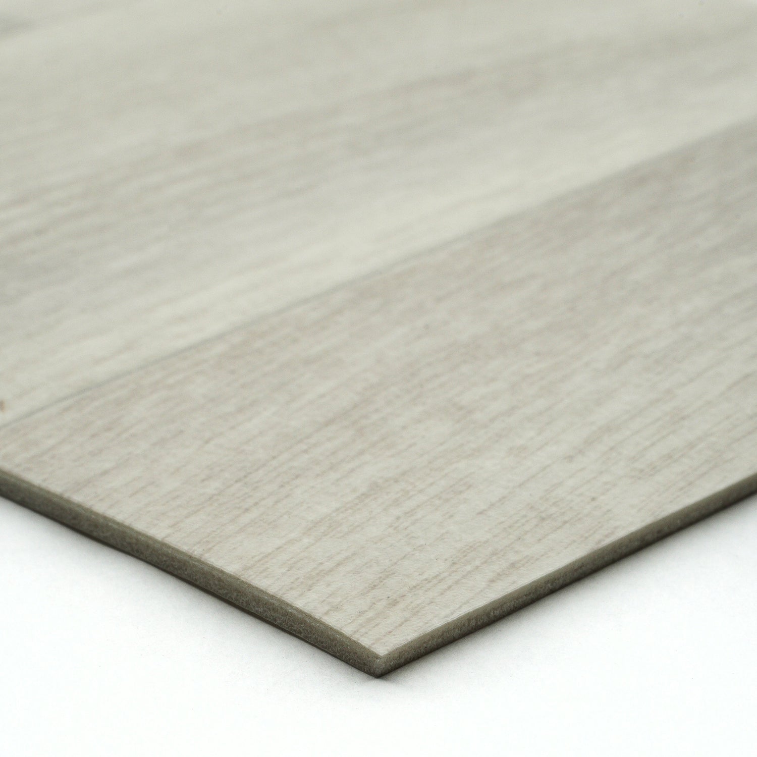 Light gray wood laminate flooring planks with textured finish for modern interior designs.