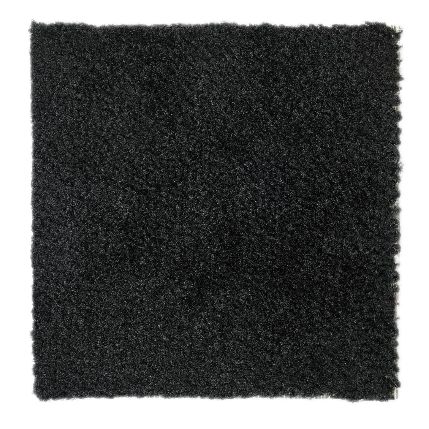 Soft black shag rug, plush texture, ideal for adding warmth to any room.