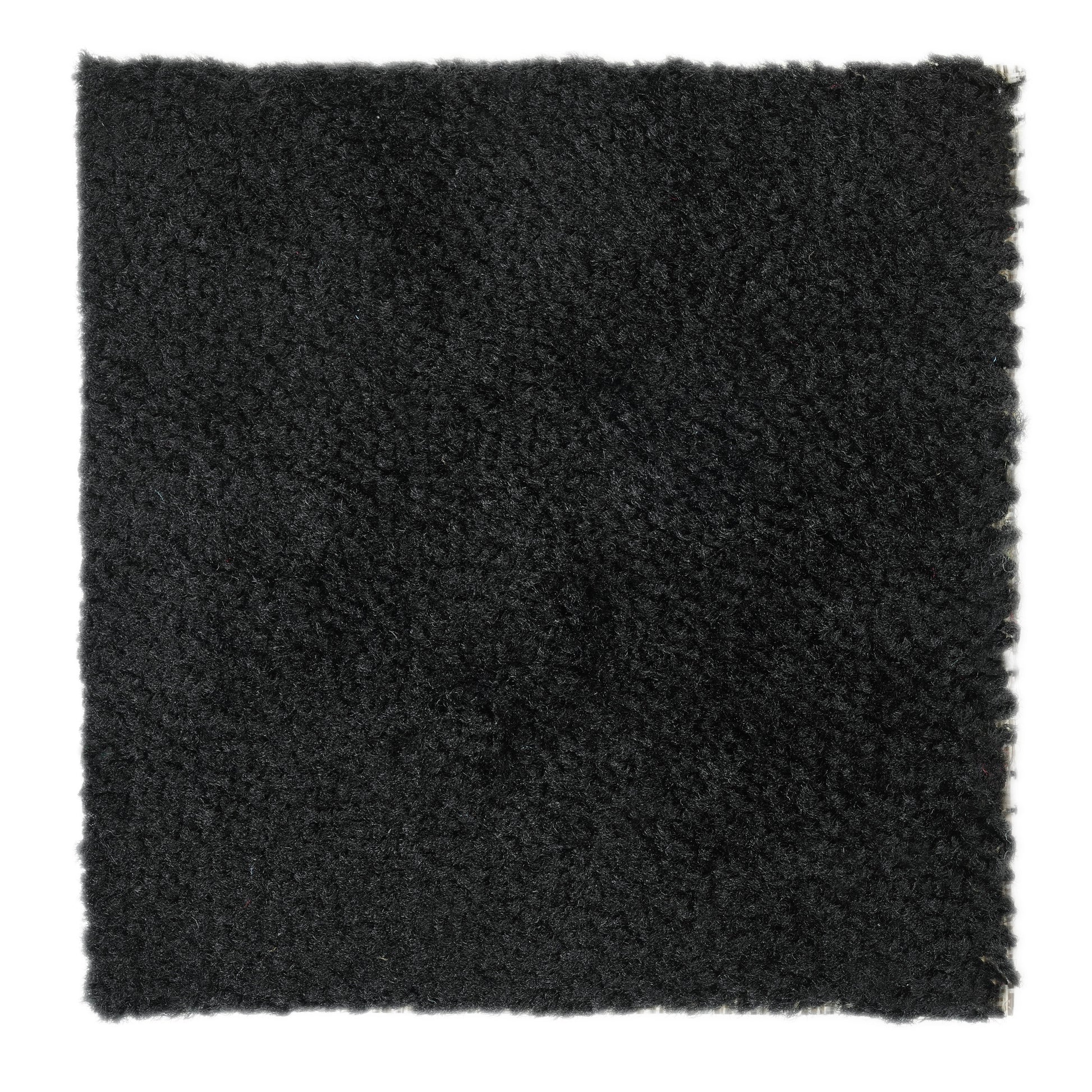 Soft black shag rug, plush texture, ideal for adding warmth to any room.