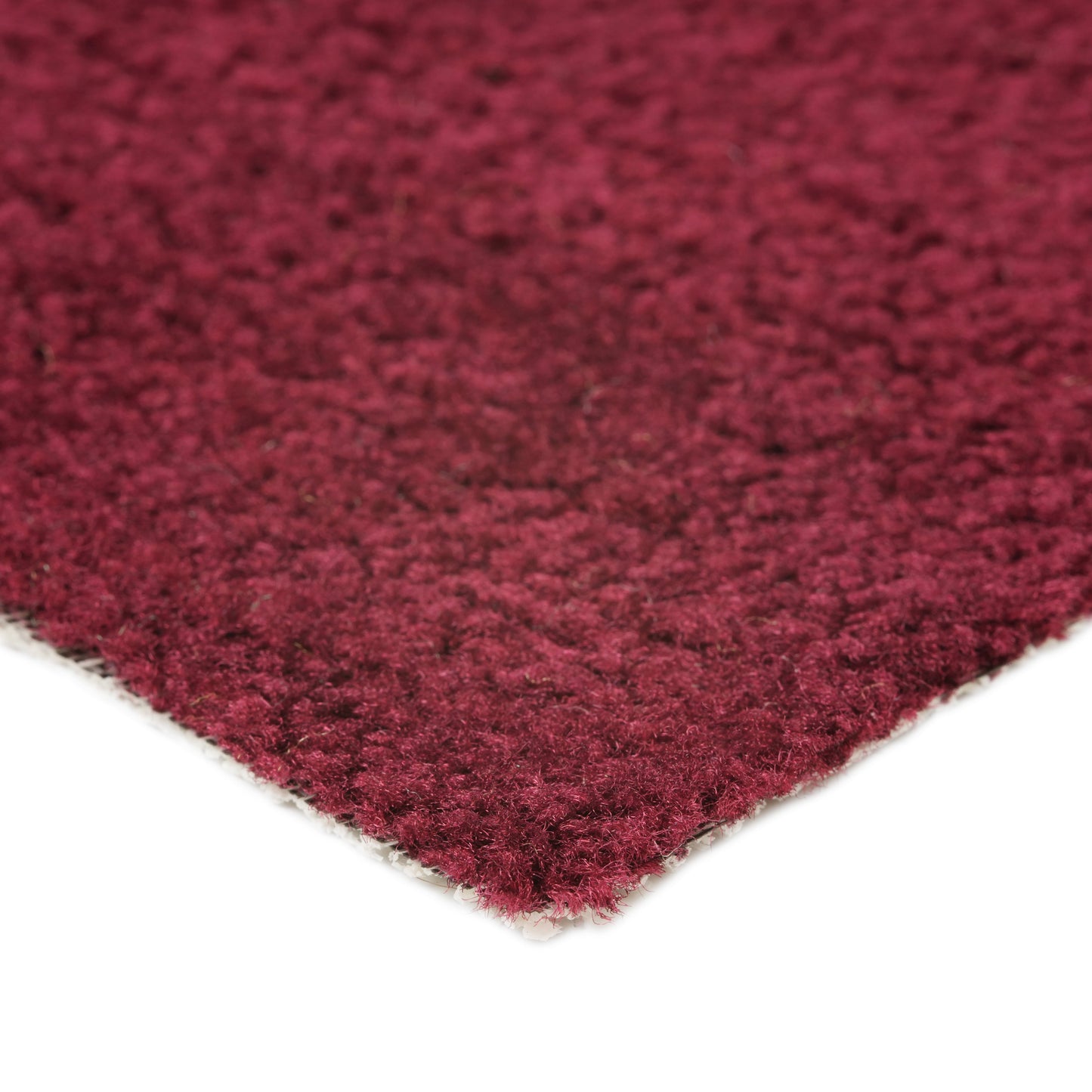 Plush burgundy area rug made of soft synthetic fibers, perfect for cozy home decor.