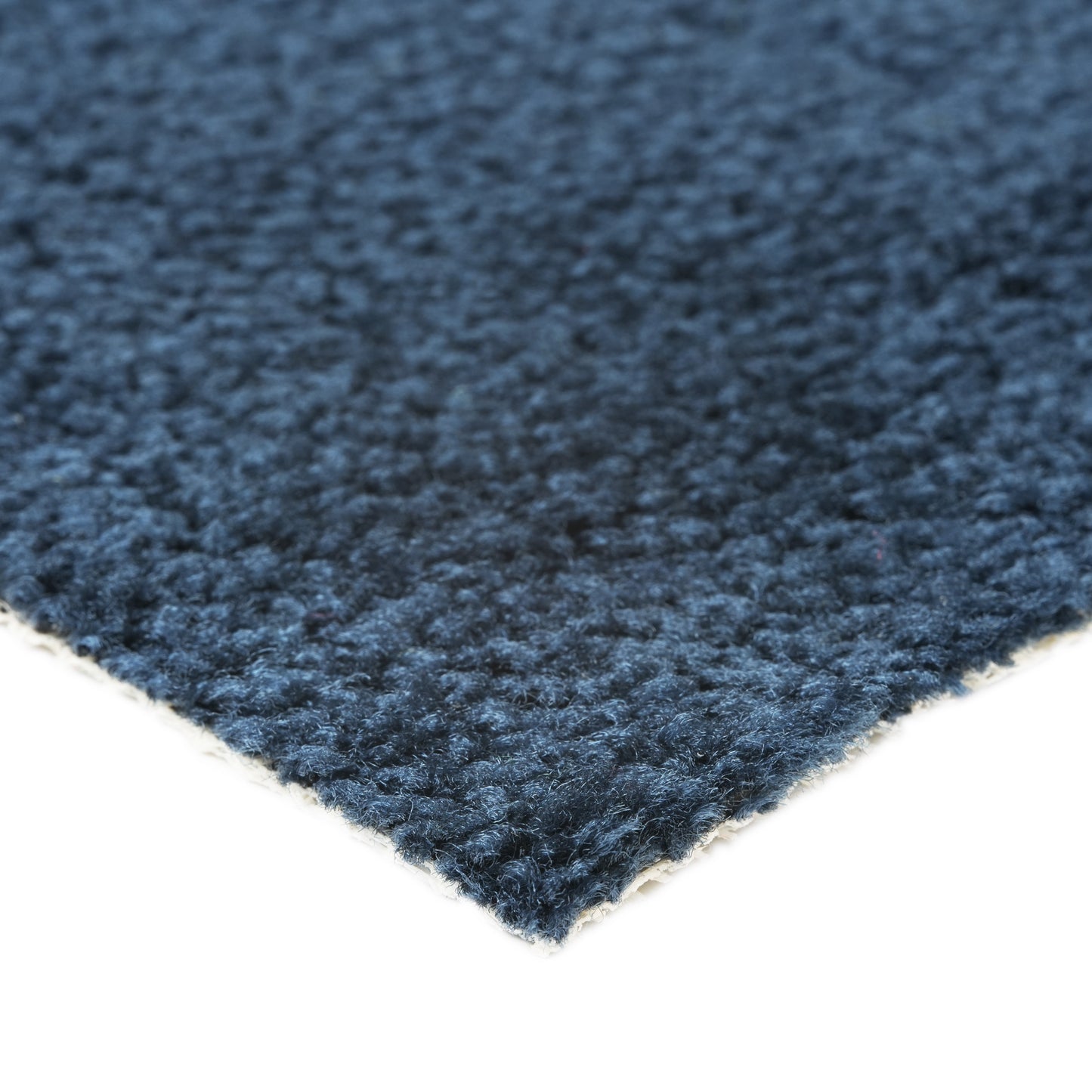 Soft navy blue carpet with textured surface, perfect for adding warmth to any room.