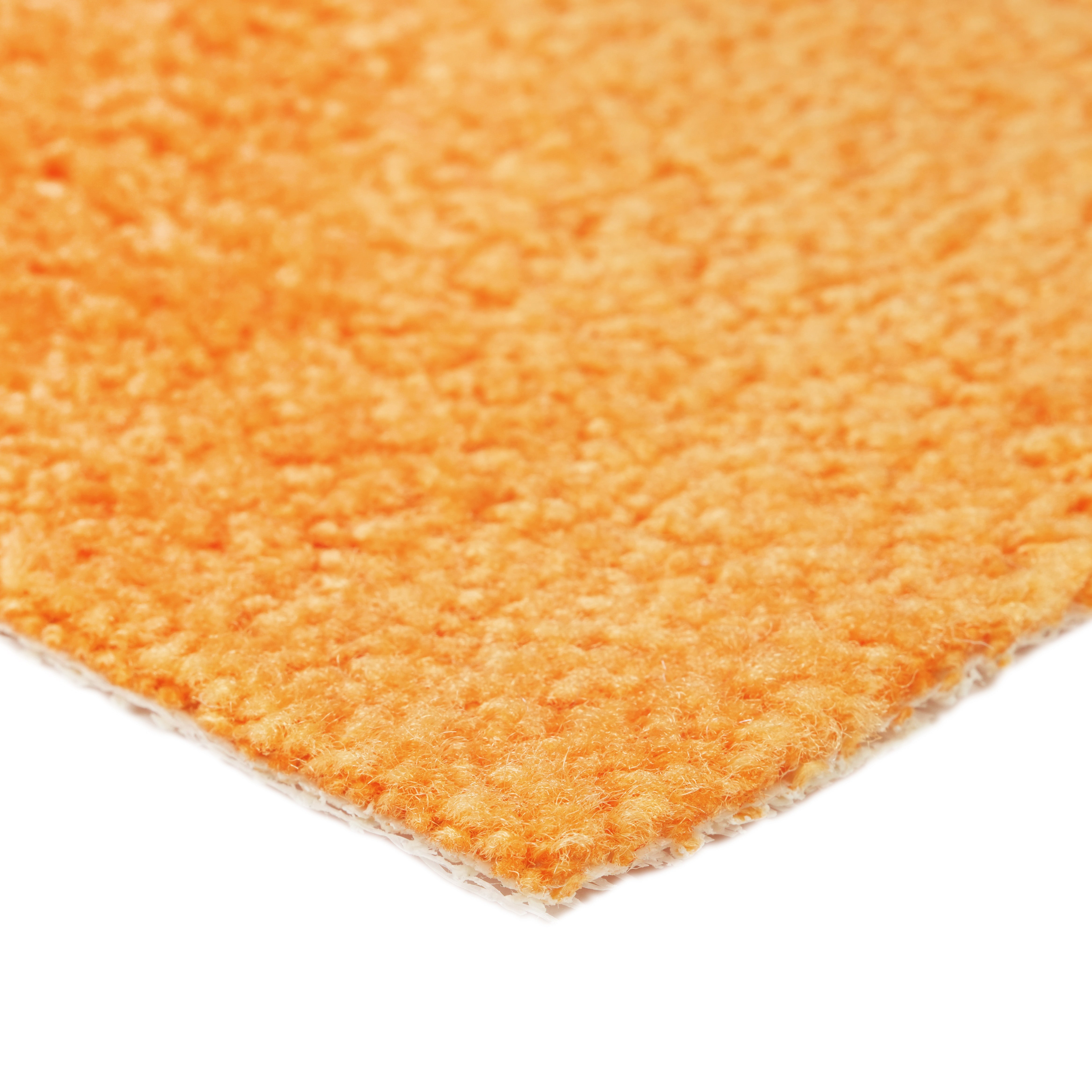 Vibrant orange plush rug with soft texture, perfect for adding warmth to any room.
