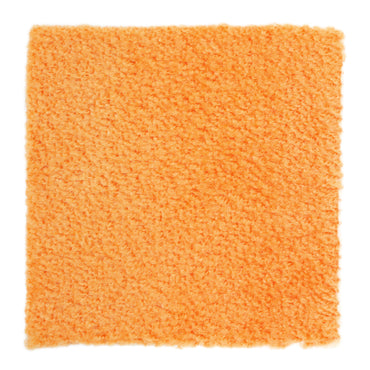 Cozy orange shag carpet, soft texture, perfect for adding warmth to any room decor.