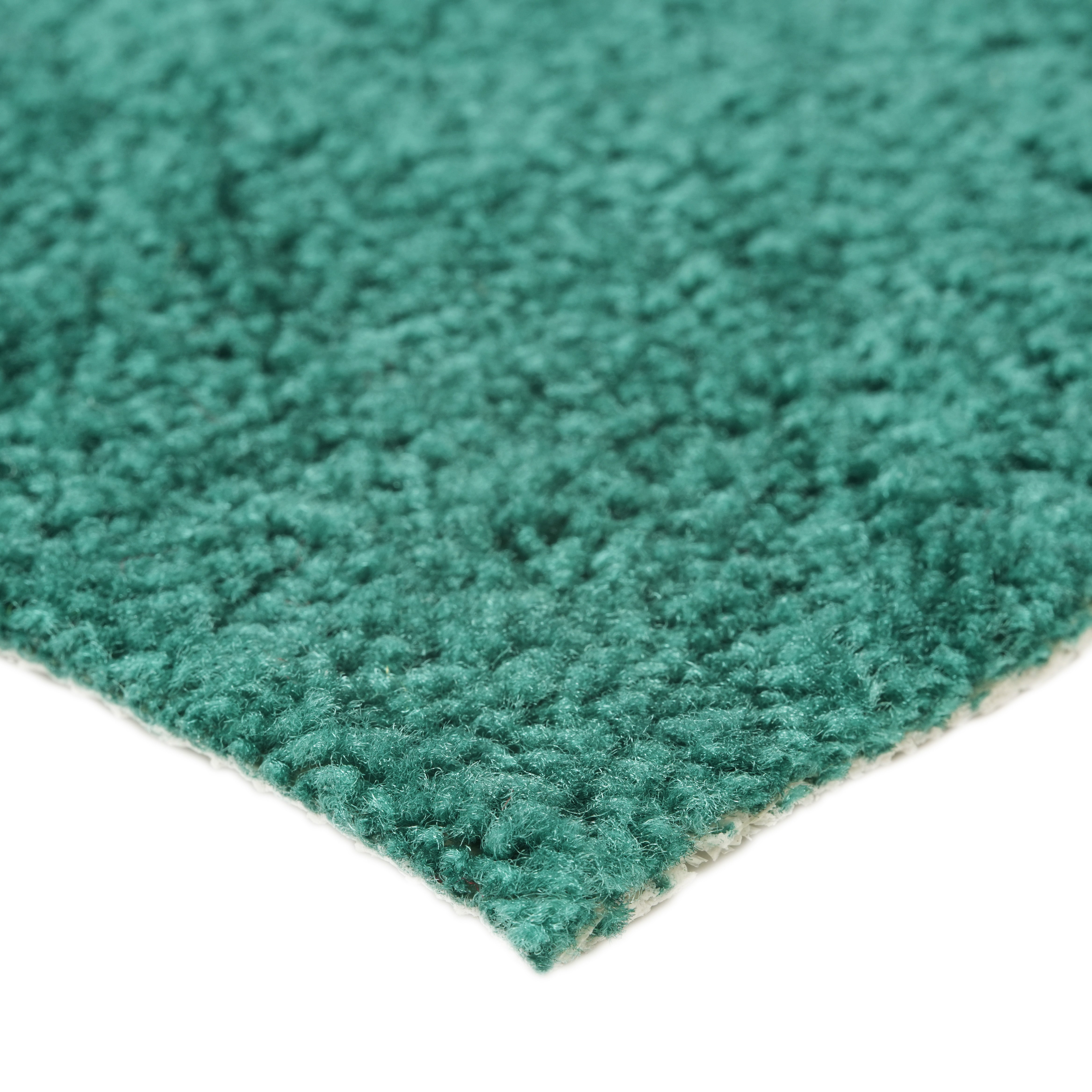 Soft teal area rug with a plush texture, perfect for adding comfort and color to any room.