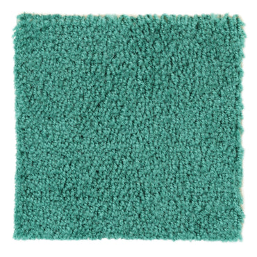 Thick teal shag carpet swatch, soft texture, ideal for modern home decor and cozy interiors.