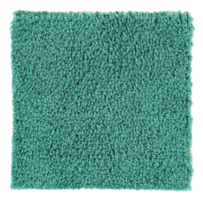 Thick teal shag carpet swatch, soft texture, ideal for modern home decor and cozy interiors.