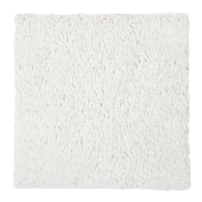 Cozy white faux fur cushion, soft texture, perfect for home decor and comfort.