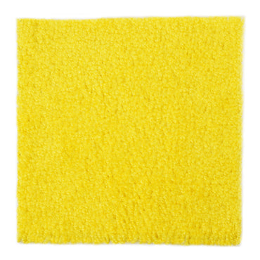 Soft yellow shaggy carpet mat, perfect for vibrant home decor and cozy spaces.