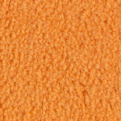 Close-up of soft orange fleece fabric, perfect for cozy clothing and home decor projects.
