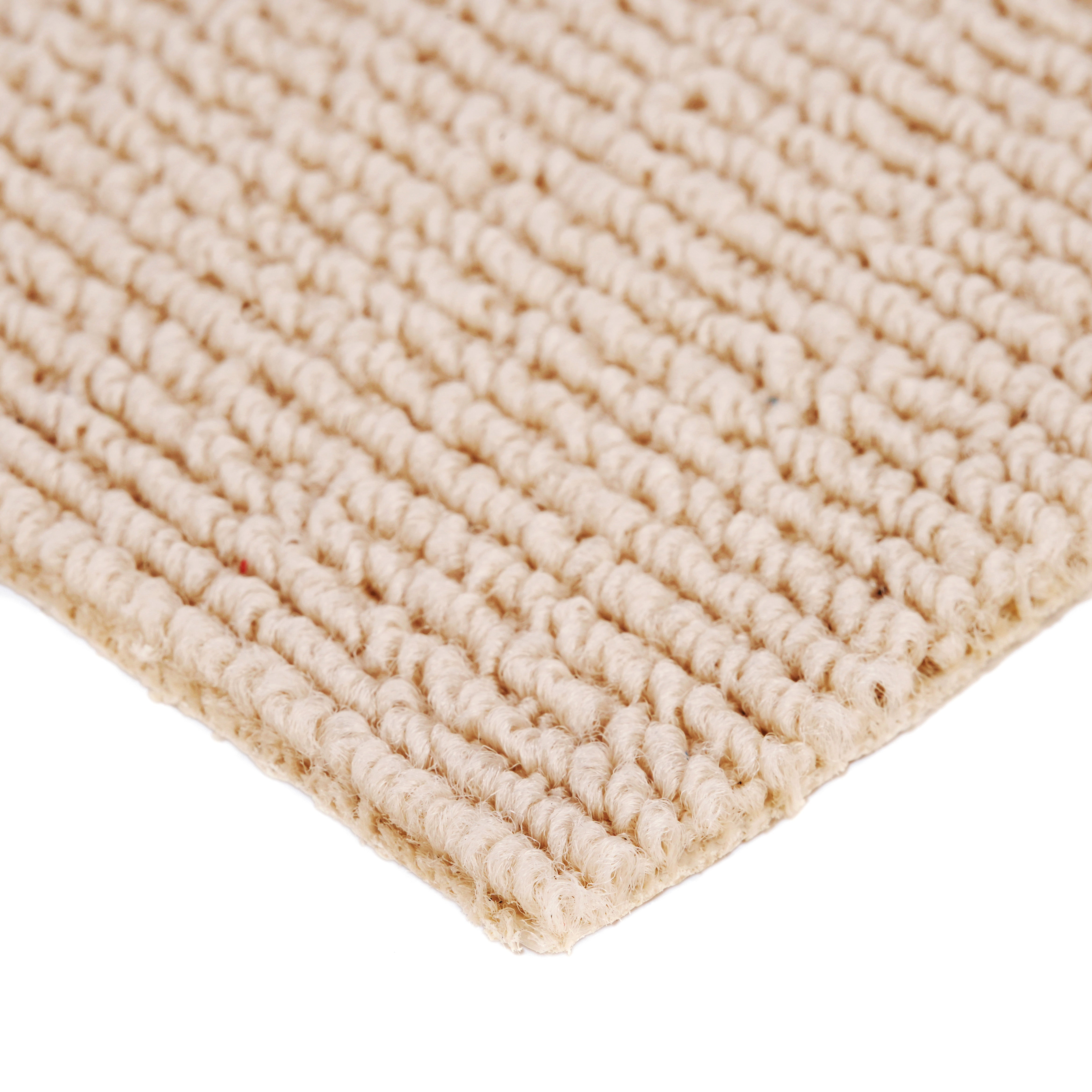 Natural beige woven area rug made from durable jute, perfect for adding texture to any room.