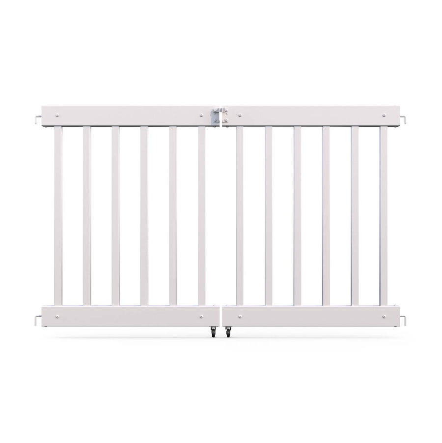 White wooden safety gate with vertical slats and secure latch, perfect for childproofing spaces.