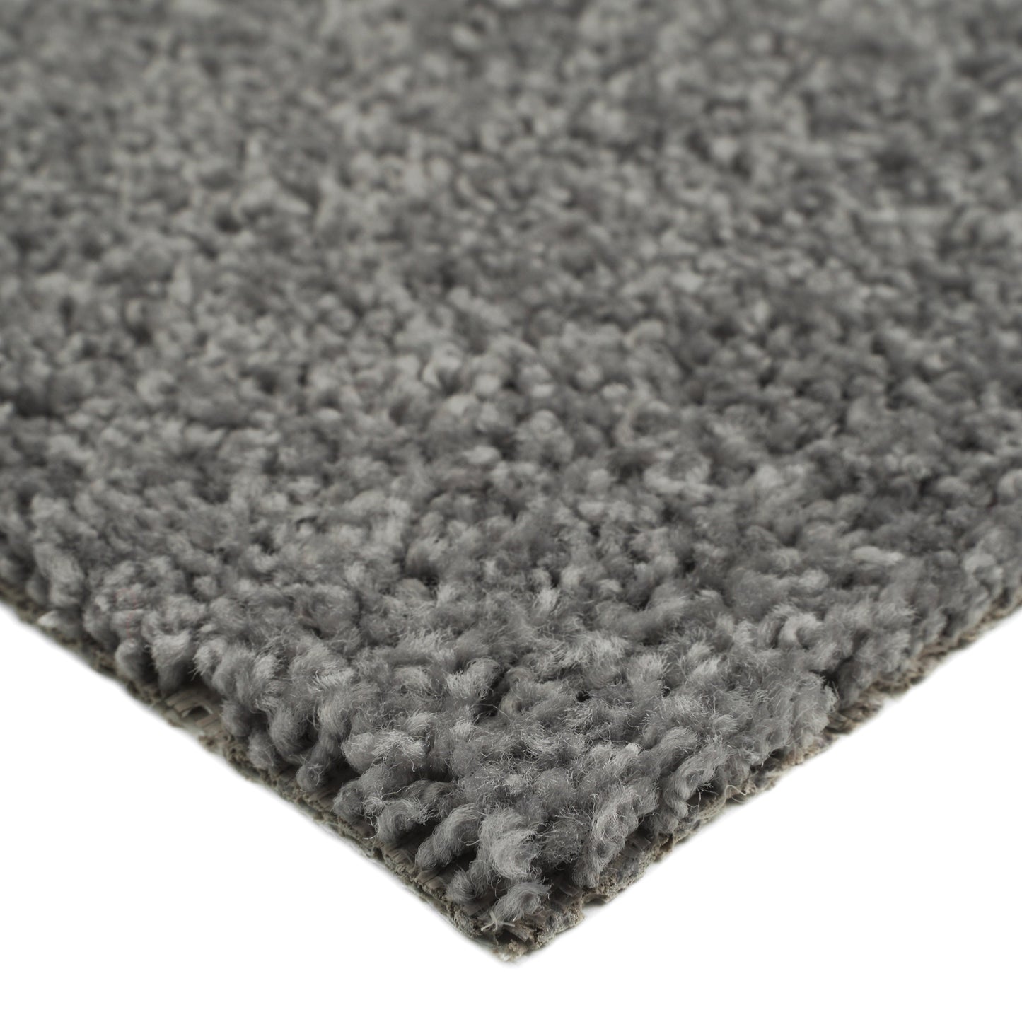 Soft gray shag rug, plush texture, ideal for living room or bedroom, adds warmth and comfort to any space.