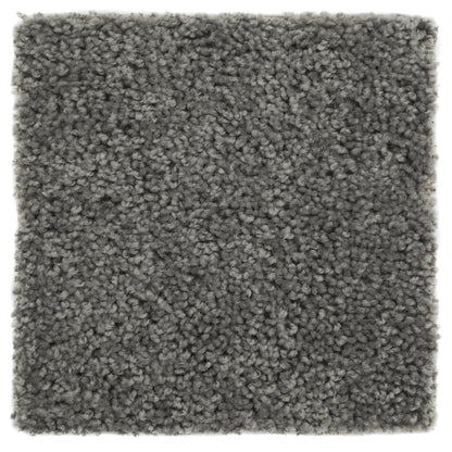 Soft gray plush carpet square, perfect for cozy home decor or as a stylish area rug.