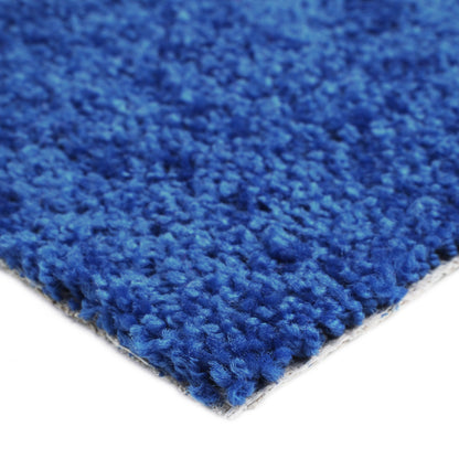 Soft blue area rug, made of plush fibers, perfect for adding comfort to any living space.