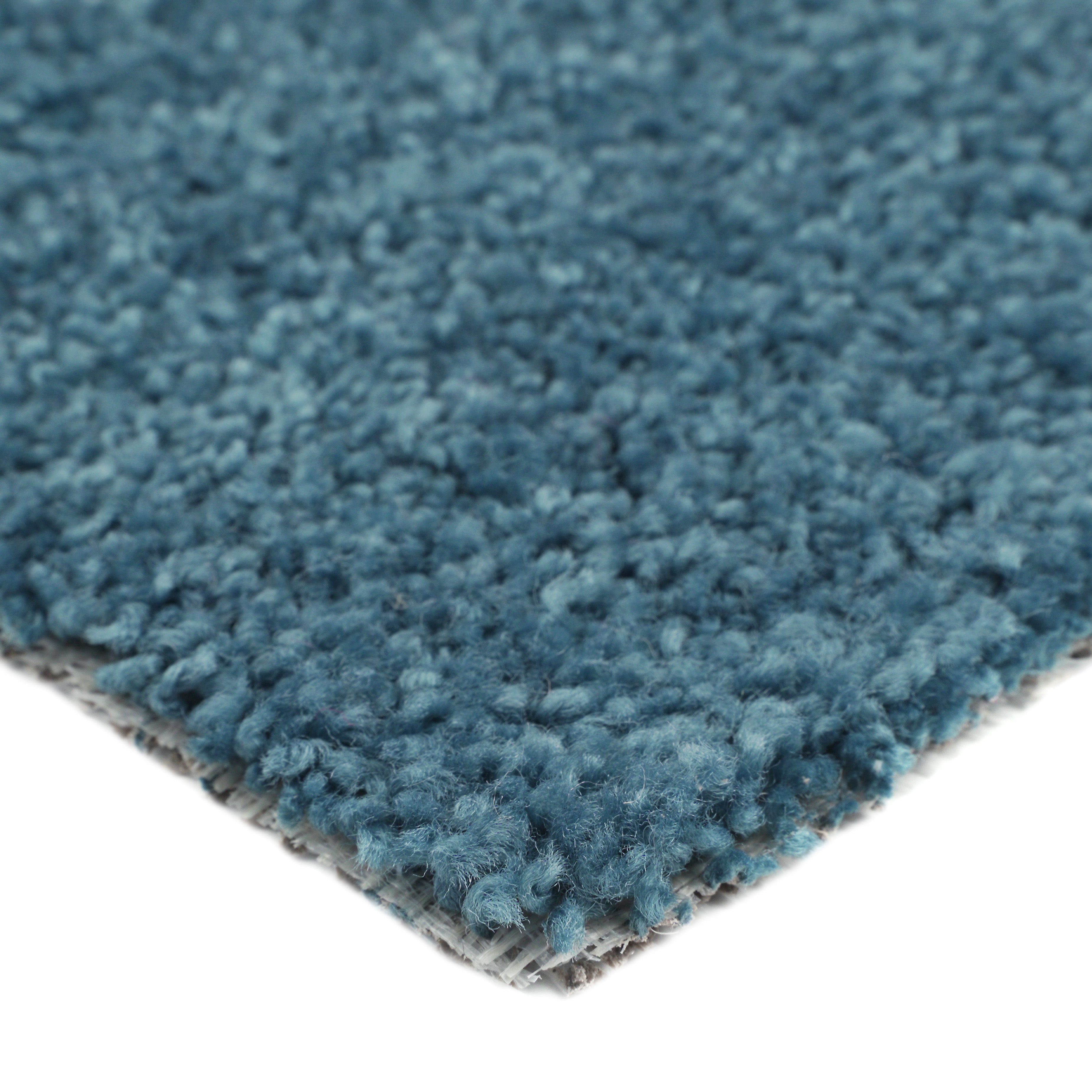 Soft blue shag rug, plush texture, perfect for modern home décor and comfortable underfoot.
