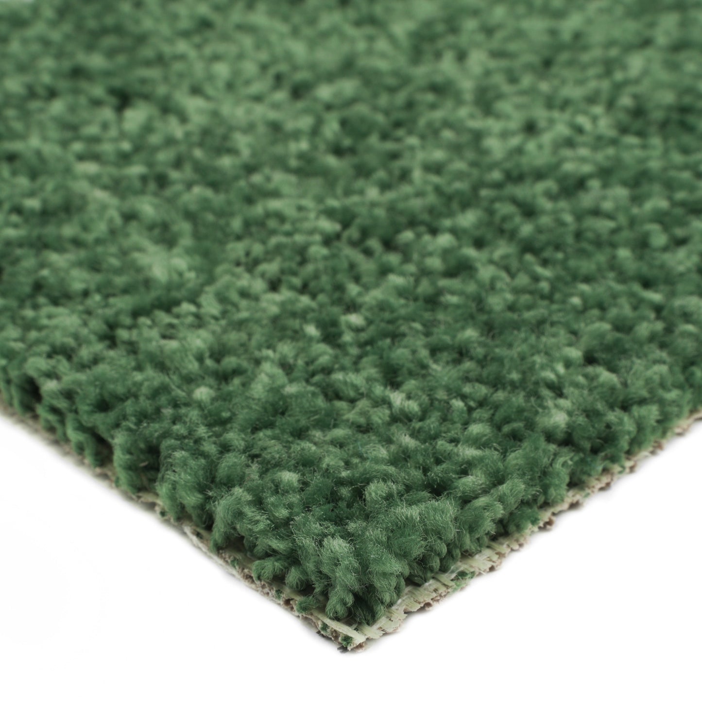 Green plush carpet rug, soft texture, ideal for home decor and cozy interiors.