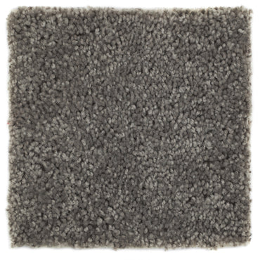 Soft gray shag area rug made of high-quality fibers for comfort and style in any room.
