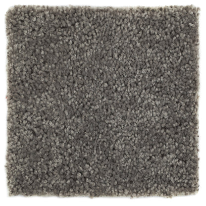 Soft gray shag area rug made of high-quality fibers for comfort and style in any room.
