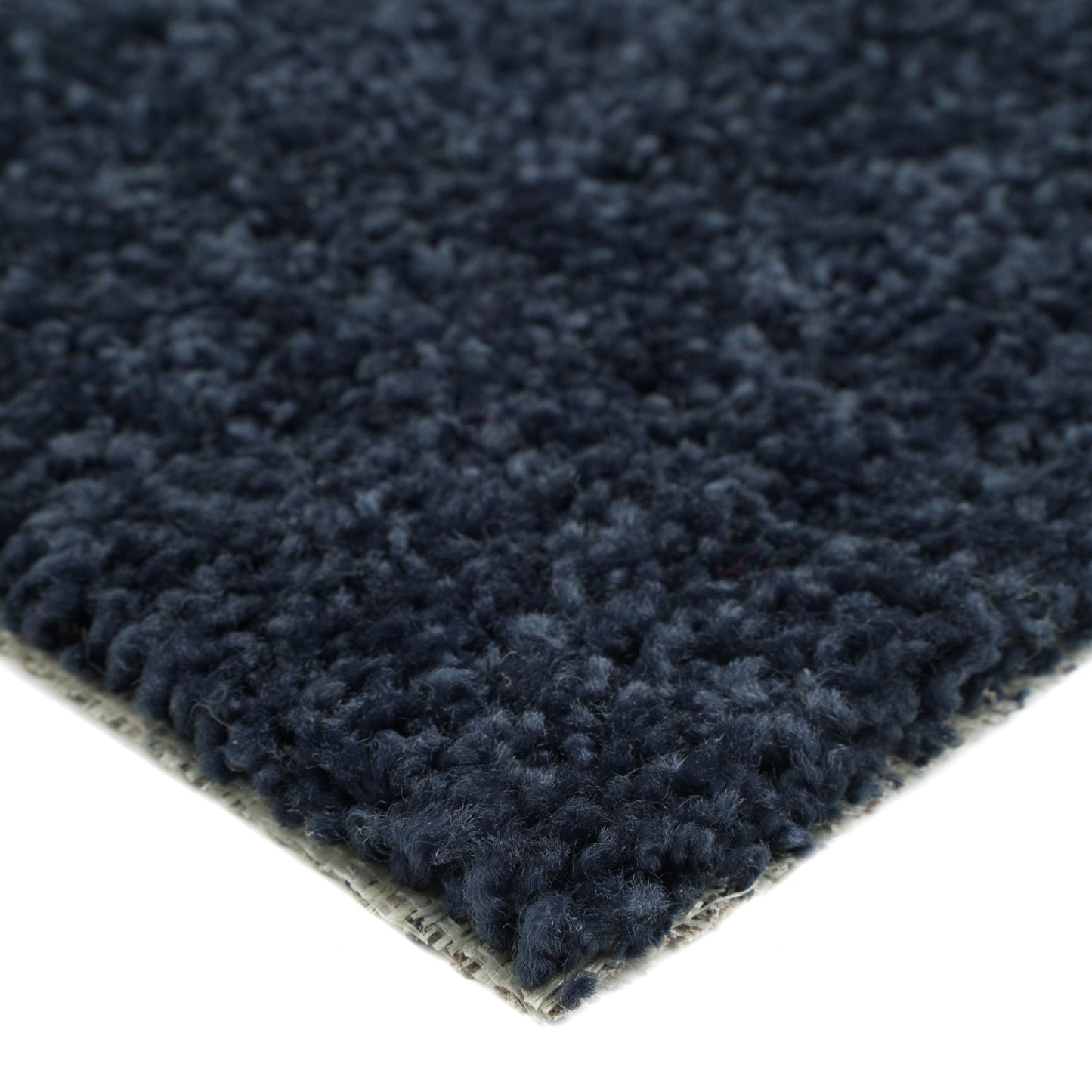 Navy blue plush area rug made of soft fabric, perfect for cozy home decor.
