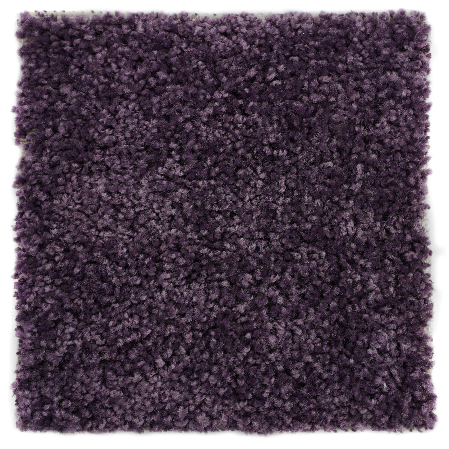 Plush purple shag rug, soft synthetic fibers, perfect for adding warmth to any room décor.