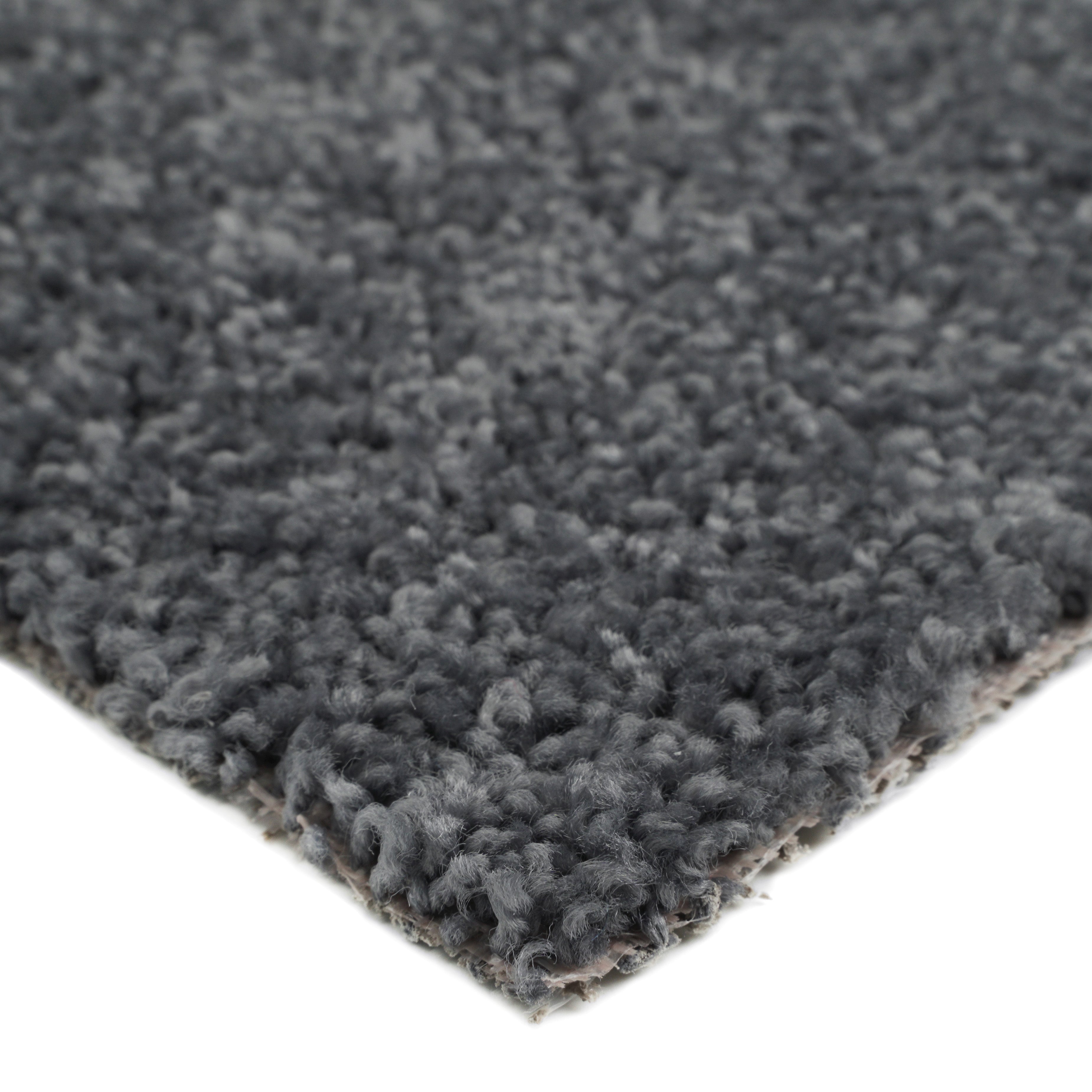 Soft gray plush area rug with thick pile, ideal for cozy living spaces and stylish decor.