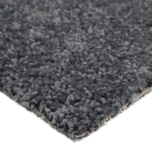 Soft gray plush area rug with thick pile, ideal for cozy living spaces and stylish decor.