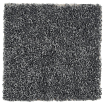 Soft gray shag rug made from high-quality synthetic material, perfect for adding comfort to any space.