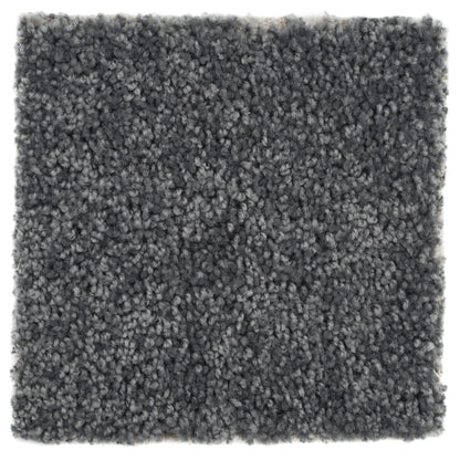 Soft gray shag rug made from high-quality synthetic material, perfect for adding comfort to any space.