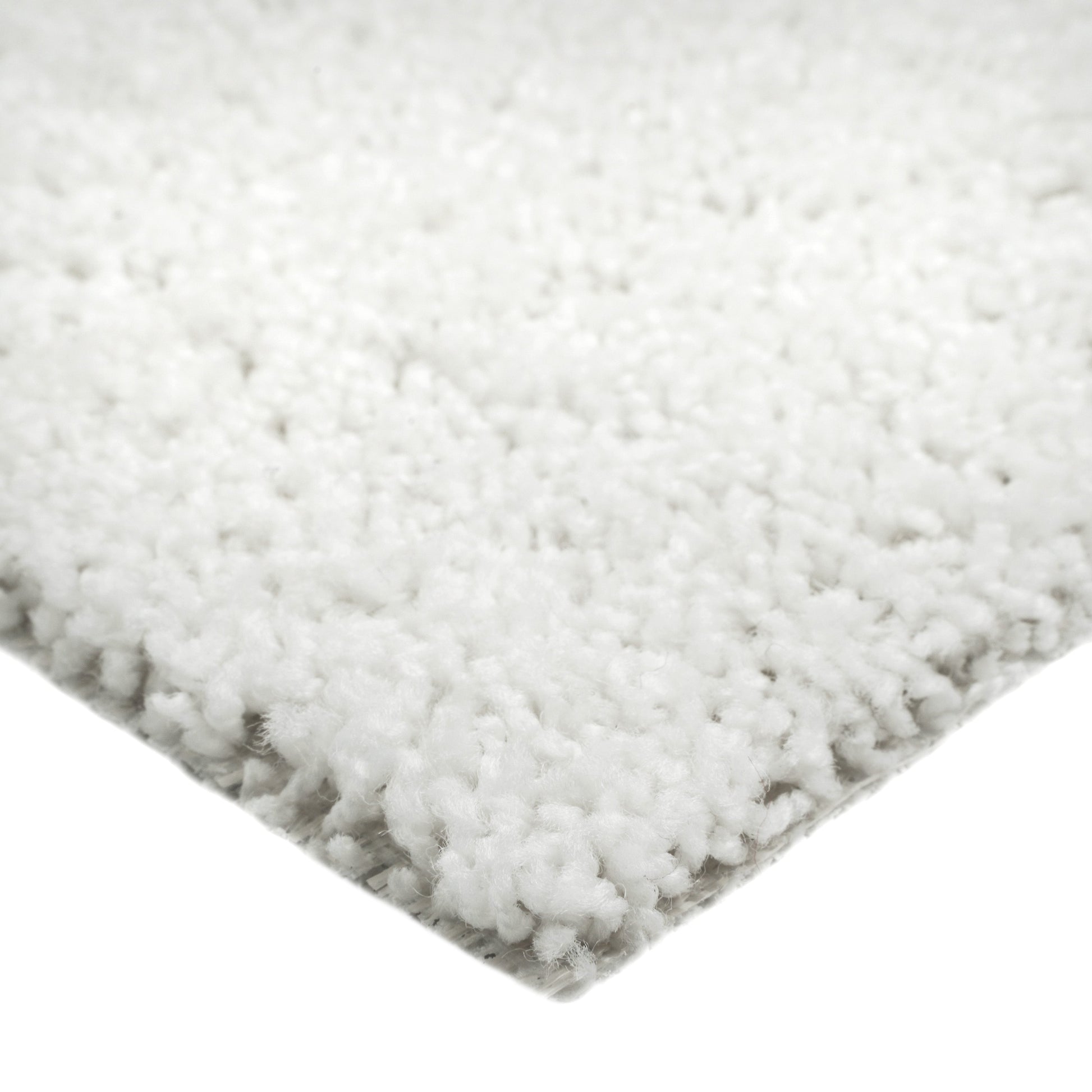Cozy white shag area rug, soft texture, perfect for living room decor or bedroom comfort.