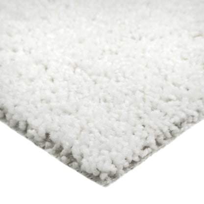 Cozy white shag area rug, soft texture, perfect for living room decor or bedroom comfort.
